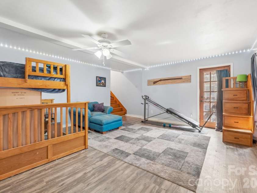 2701 Cedar Trail Lane, Wingate, NC 28174.  MLS# CAR4422344, YatesRealty ID 51449. Completed basement with connection to the greenhouse.