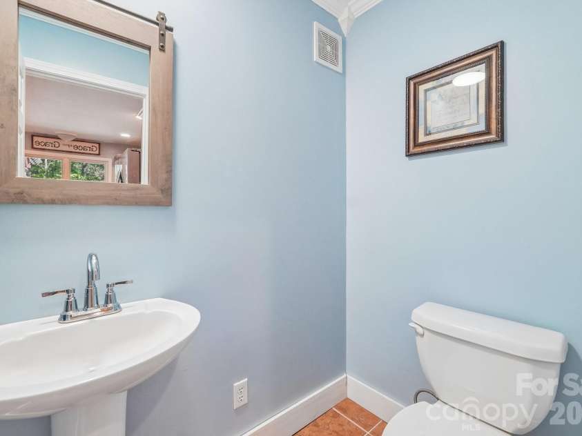 2701 Cedar Trail Lane, Wingate, NC 28174.  MLS# CAR4422344, YatesRealty ID 51449. Half bath located near the kitchen