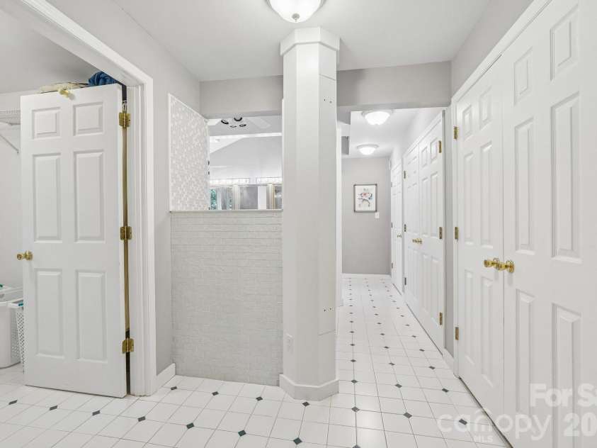 2701 Cedar Trail Lane, Wingate, NC 28174.  MLS# CAR4422344, YatesRealty ID 51449. Large primary suite bathroom