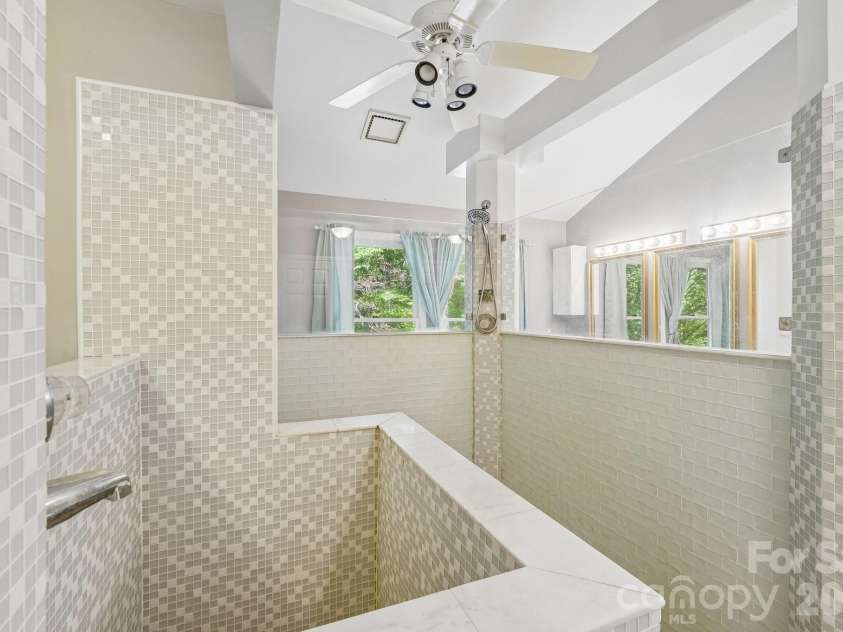2701 Cedar Trail Lane, Wingate, NC 28174.  MLS# CAR4422344, YatesRealty ID 51449. Primary suite shower room.