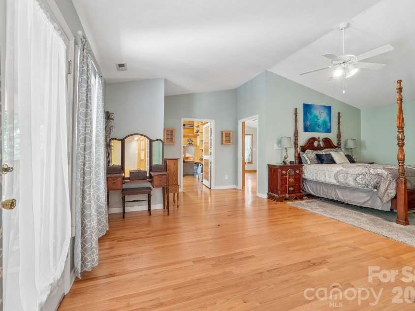 2701 Cedar Trail Lane, Wingate, NC 28174.  MLS# CAR4422344, YatesRealty ID 51449. Primary suite with two flex rooms/office space, laundry room, large bathroom and closet.