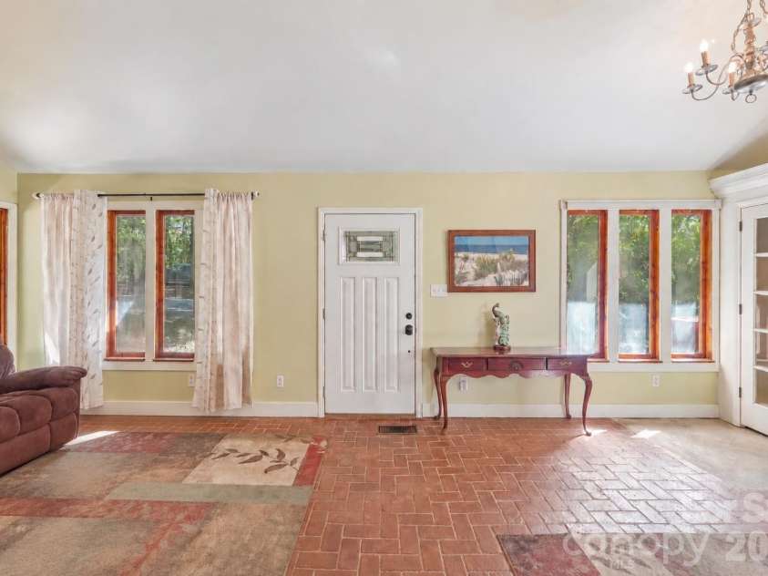 2701 Cedar Trail Lane, Wingate, NC 28174.  MLS# CAR4422344, YatesRealty ID 51449. Spacious 2-story, entry-way with brick flooring.