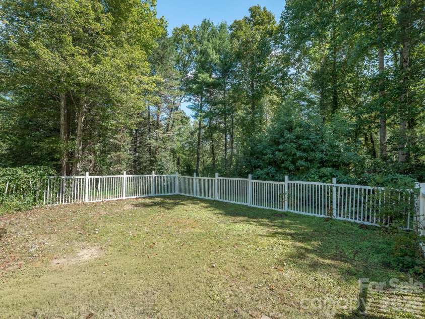 106 Fish Hawk Drive, Hendersonville, NC 28739.  MLS# CAR4425849, YatesRealty ID 51450. Fenced back yard