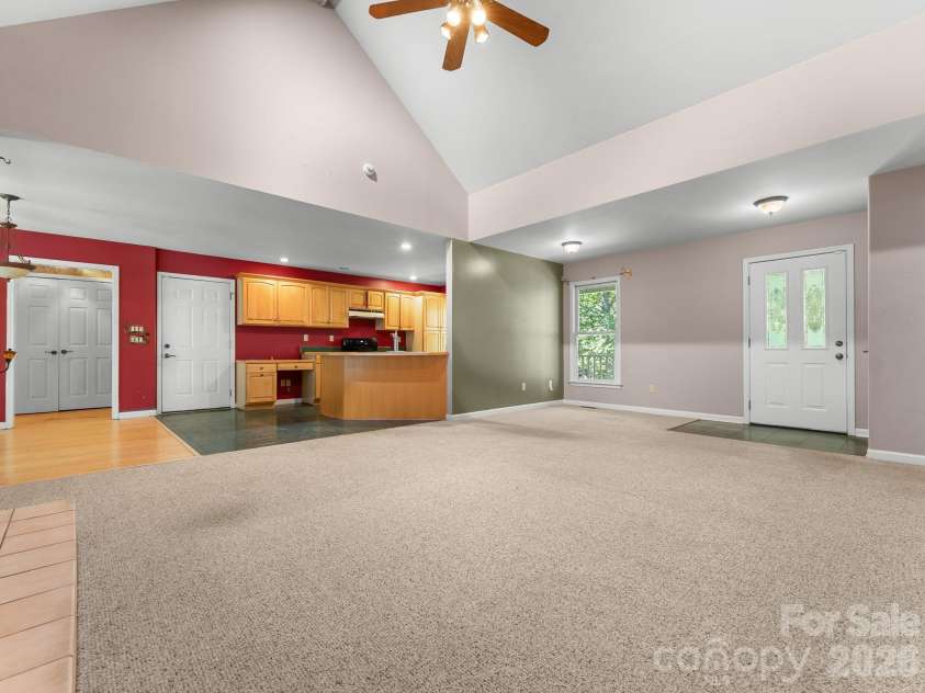 106 Fish Hawk Drive, Hendersonville, NC 28739.  MLS# CAR4425849, YatesRealty ID 51450. Great Room overlooking kitchen and dining area