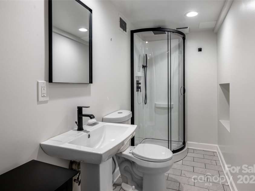 54 Fairway Road, Asheville, NC 28804.  MLS# CAR4238244, YatesRealty ID 5146. Lower Level - Fully Remodeled Bathroom