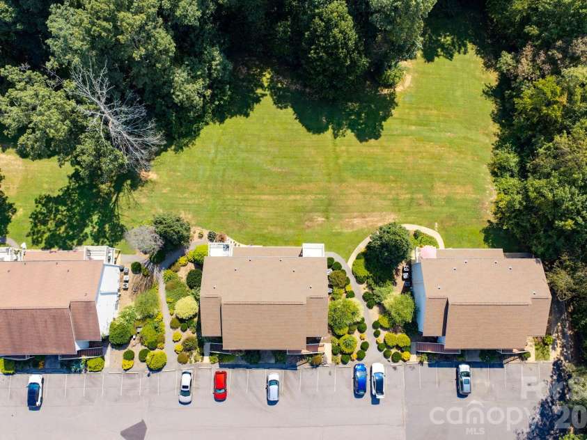 15 Krista Circle, Candler, NC 28715.  MLS# CAR4421478, YatesRealty ID 51466. 15 - Middle building, third on the left