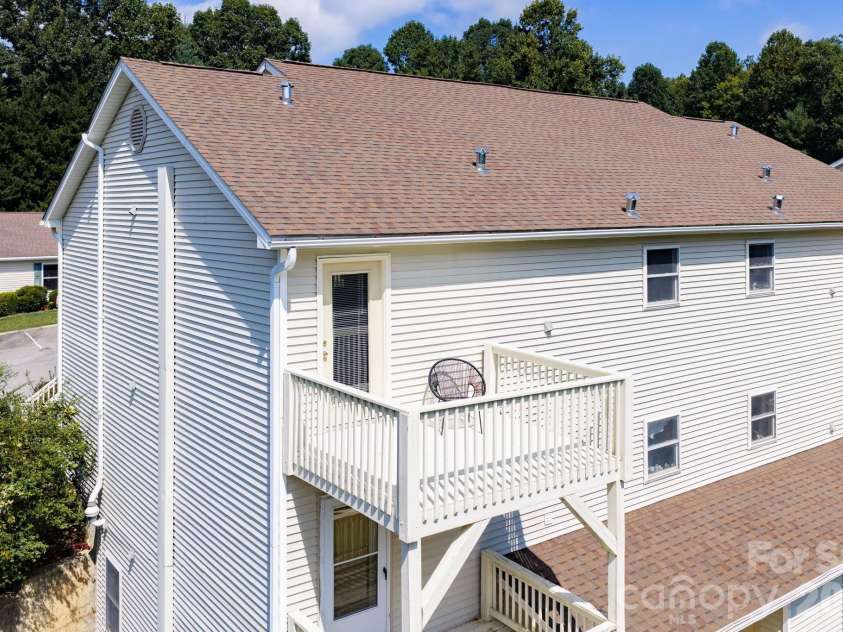 15 Krista Circle, Candler, NC 28715.  MLS# CAR4421478, YatesRealty ID 51466. Back deck refinished