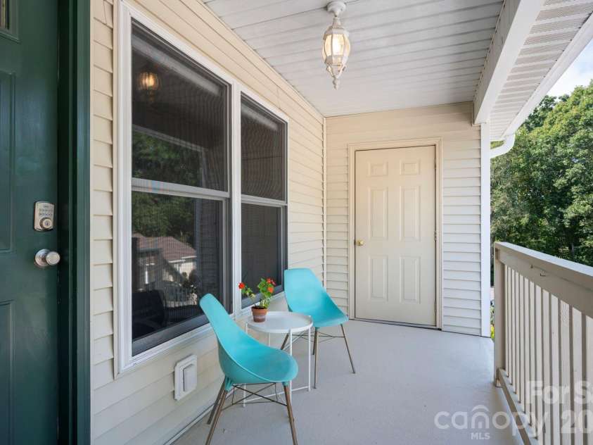 15 Krista Circle, Candler, NC 28715.  MLS# CAR4421478, YatesRealty ID 51466. Covered front porch and extra storage closet
