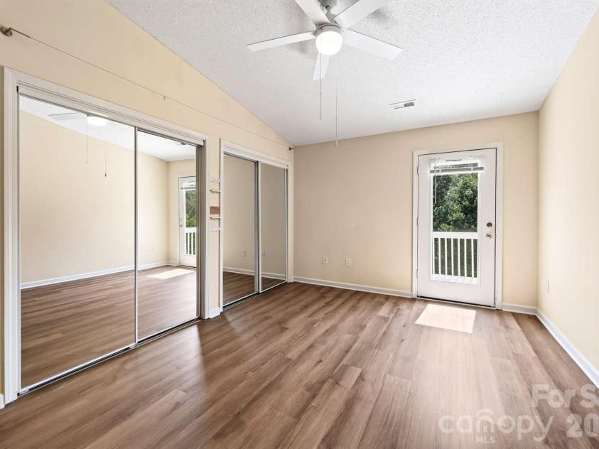 15 Krista Circle, Candler, NC 28715.  MLS# CAR4421478, YatesRealty ID 51466. Door to private back deck off primary