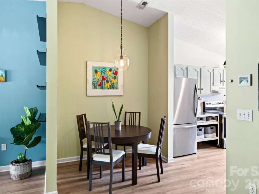 15 Krista Circle, Candler, NC 28715.  MLS# CAR4421478, YatesRealty ID 51466. Living room flows to kitchen