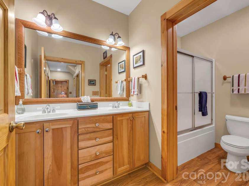 4880 Nightingale Lane, Lenoir, NC 28645.  MLS# CAR4423814, YatesRealty ID 51469. Lower-level full bath (the toilet/shower room does not have a direct heat source)