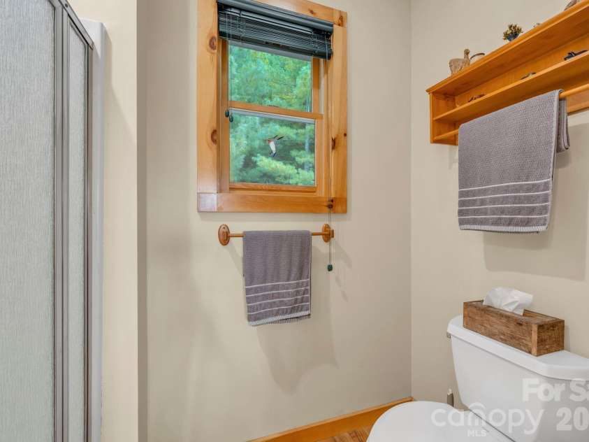 4880 Nightingale Lane, Lenoir, NC 28645.  MLS# CAR4423814, YatesRealty ID 51469. Main-level primary suite bath