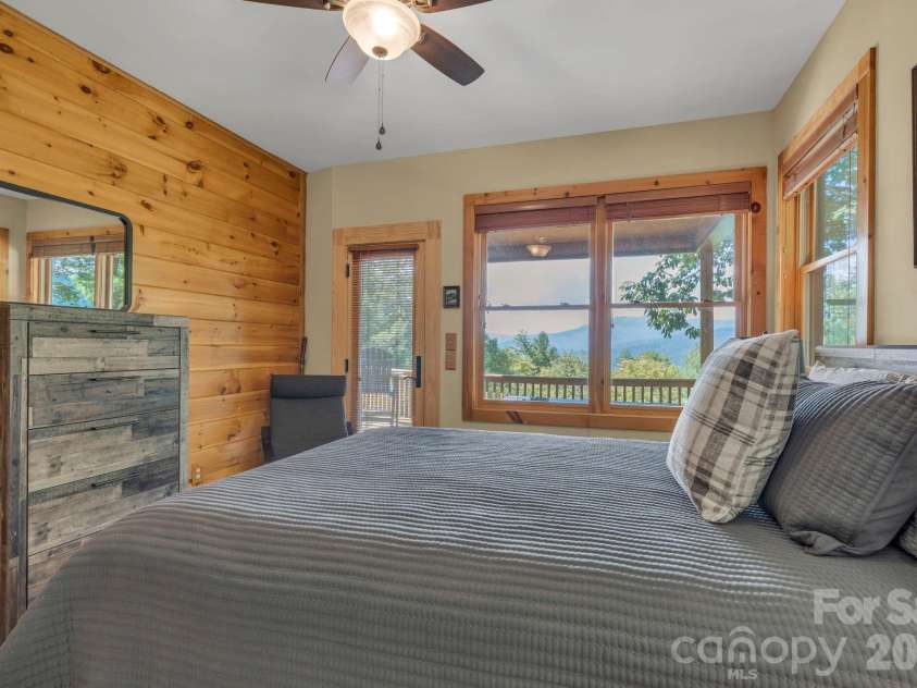 4880 Nightingale Lane, Lenoir, NC 28645.  MLS# CAR4423814, YatesRealty ID 51469. Main-level primary suite - VIEWS throughout the home!