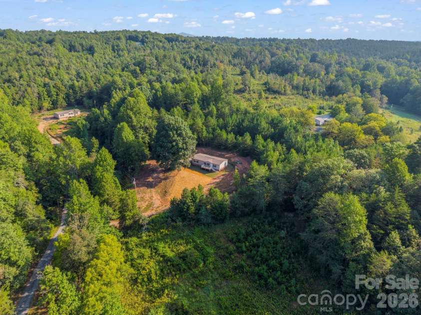 184 Crawford Hollow, Rutherfordton, NC 28139.  MLS# CAR4424597, YatesRealty ID 51486. Beautiful Private Oasis w/Long Range Winter Mountain View