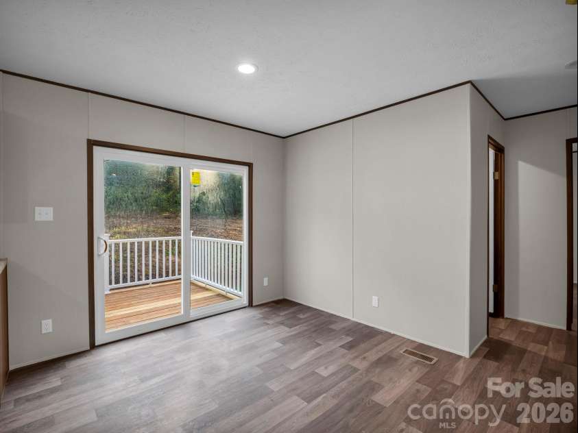 184 Crawford Hollow, Rutherfordton, NC 28139.  MLS# CAR4424597, YatesRealty ID 51486. Dining Room w/Sliding Doors to Back Deck