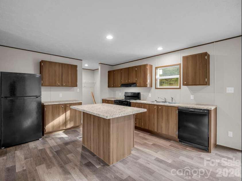 184 Crawford Hollow, Rutherfordton, NC 28139.  MLS# CAR4424597, YatesRealty ID 51486. Laundry Room Off Kitchen