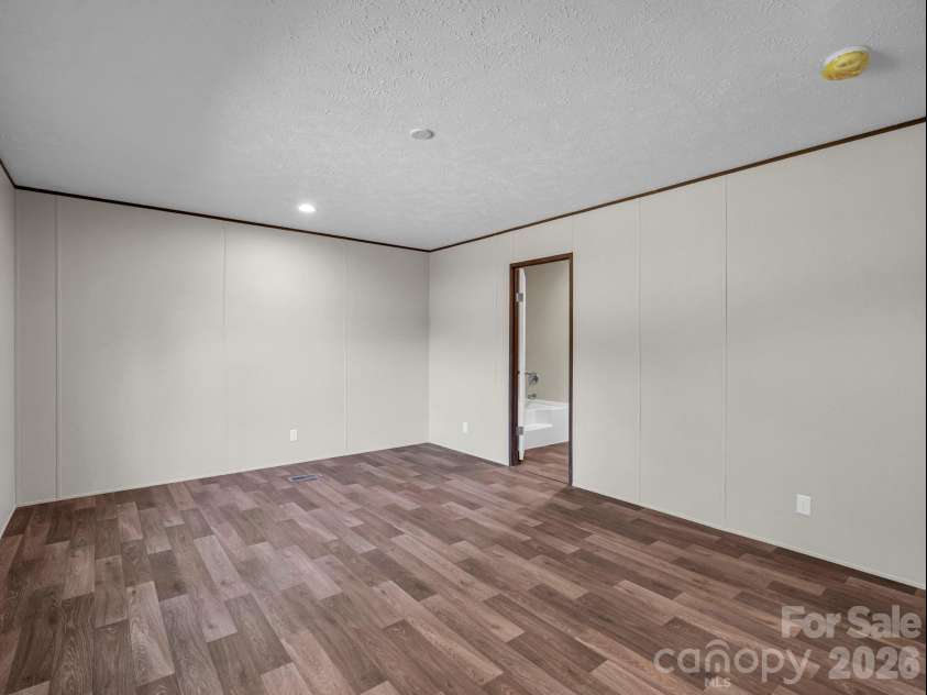 184 Crawford Hollow, Rutherfordton, NC 28139.  MLS# CAR4424597, YatesRealty ID 51486. Primary Bedroom