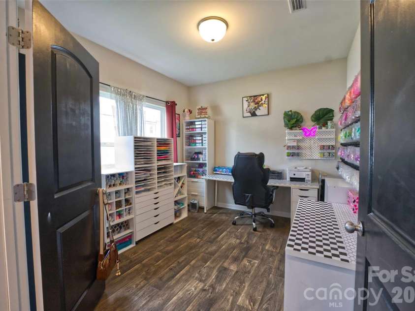 5113 Thomasville Drive, Belmont, NC 28012.  MLS# CAR4426070, YatesRealty ID 51498. Flex room, currently used as hobby space