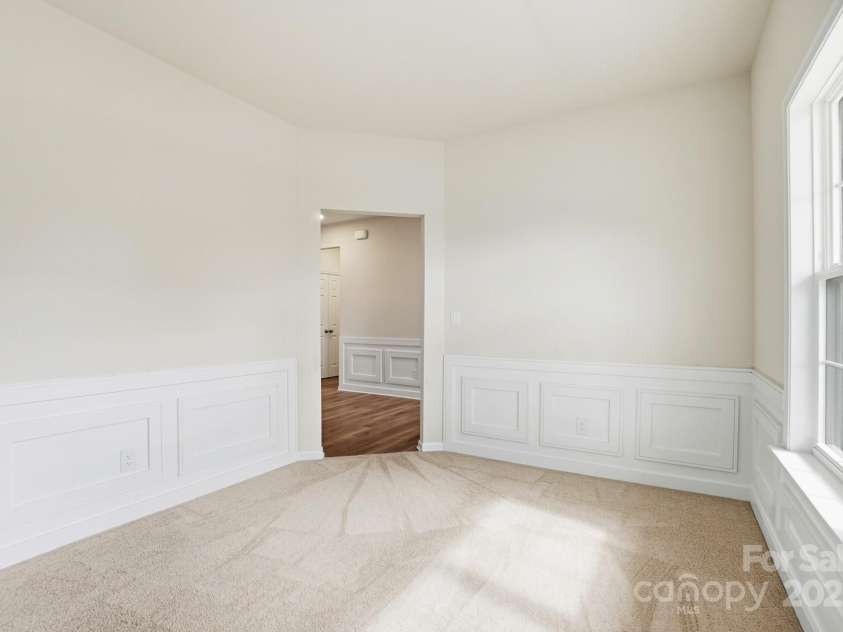 17909 Wilbanks Drive, Charlotte, NC 28278.  MLS# CAR4310693, YatesRealty ID 515. Home office with wainscotting