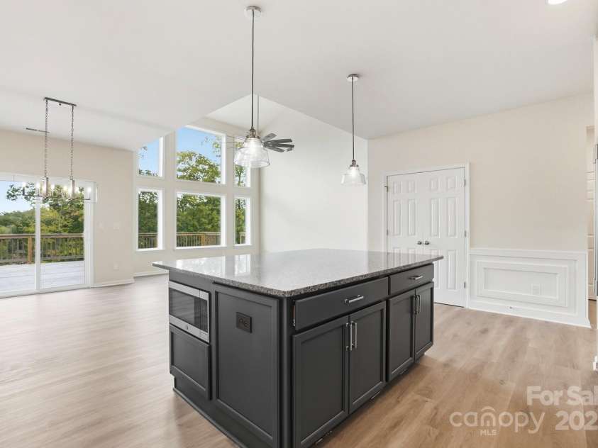 17909 Wilbanks Drive, Charlotte, NC 28278.  MLS# CAR4310693, YatesRealty ID 515. This culinary hub flows seamlessly into the Vaulted Great Room, creating the perfect space for daily living