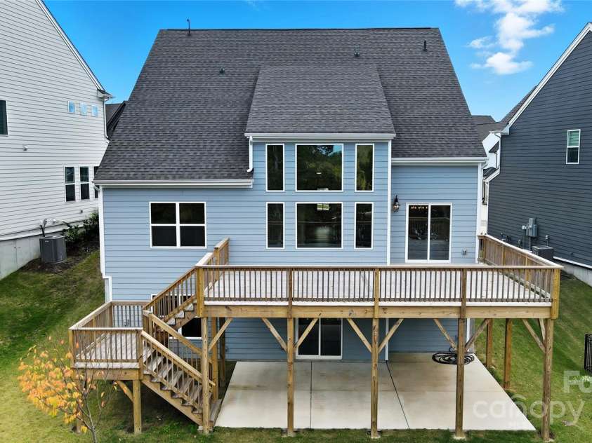 17909 Wilbanks Drive, Charlotte, NC 28278.  MLS# CAR4310693, YatesRealty ID 515. This gorgeous home is perfectly positioned to maximize outdoor enjoyment, featuring a fabulous deck, a covered patio, and a private floating dock—ideal spots for outdoor entertaining or simply soaking in the serene lake