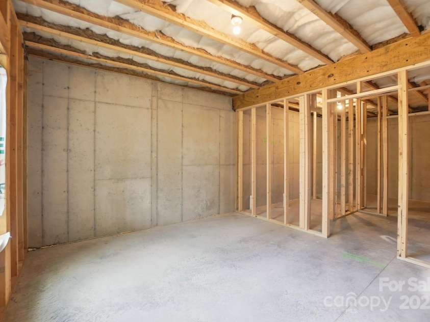 17909 Wilbanks Drive, Charlotte, NC 28278.  MLS# CAR4310693, YatesRealty ID 515. Unfinished area waiting your finishing touches