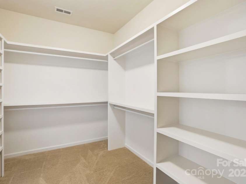 17909 Wilbanks Drive, Charlotte, NC 28278.  MLS# CAR4310693, YatesRealty ID 515. Walk in closet with custom shelving