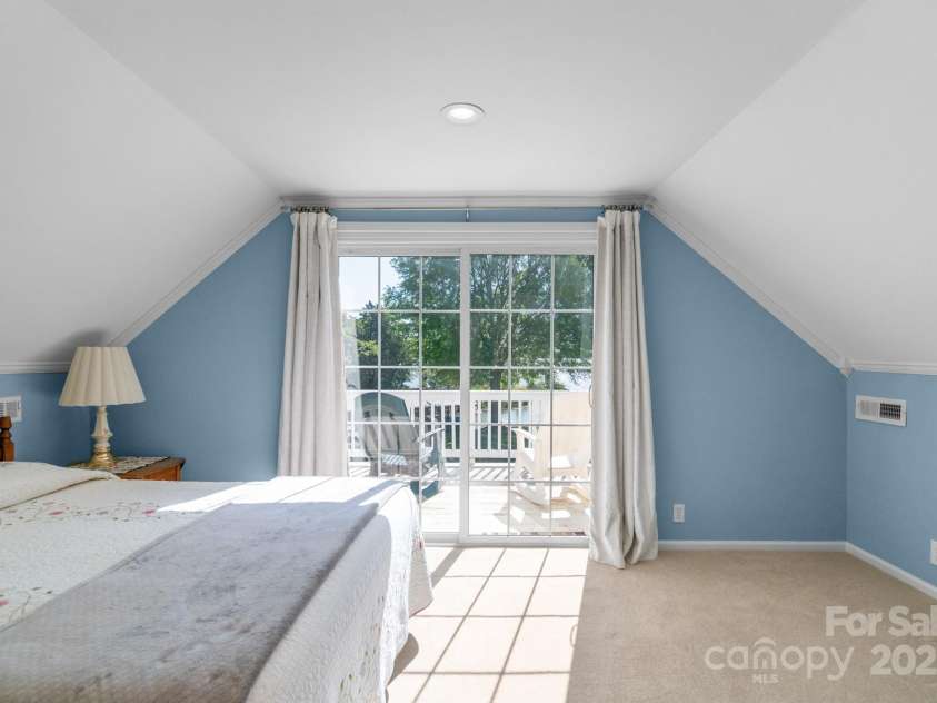 421 Tranquil Bay Circle, Norwood, NC 28128.  MLS# CAR4238311, YatesRealty ID 5150. 3rd BR with balcony