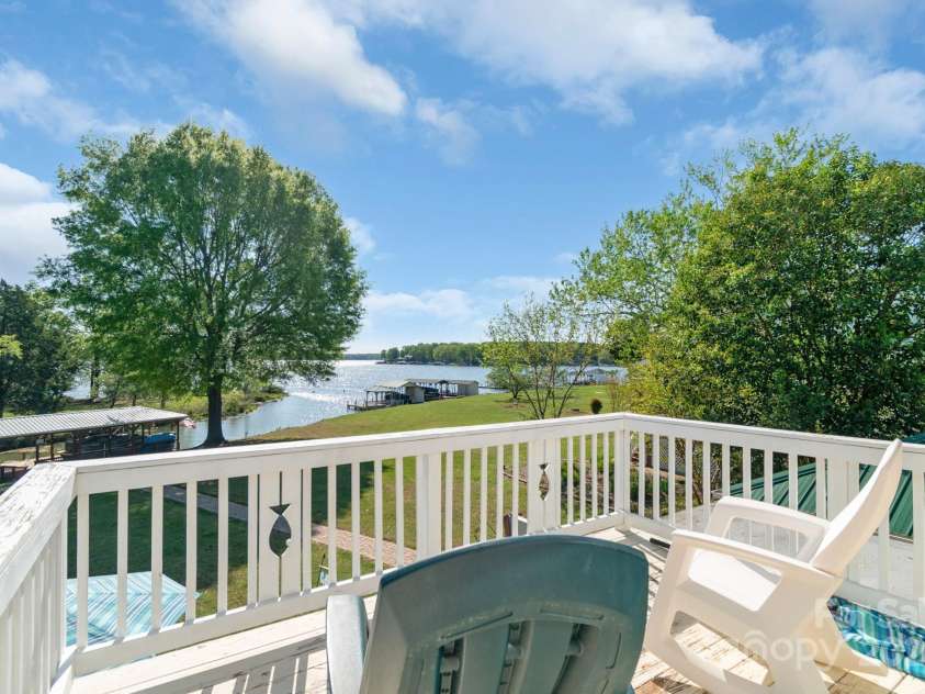 421 Tranquil Bay Circle, Norwood, NC 28128.  MLS# CAR4238311, YatesRealty ID 5150. Balcony with lake view