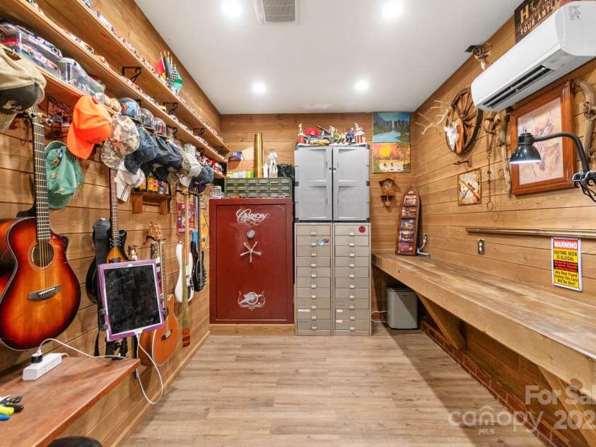 421 Tranquil Bay Circle, Norwood, NC 28128.  MLS# CAR4238311, YatesRealty ID 5150. Safe room/Workshop