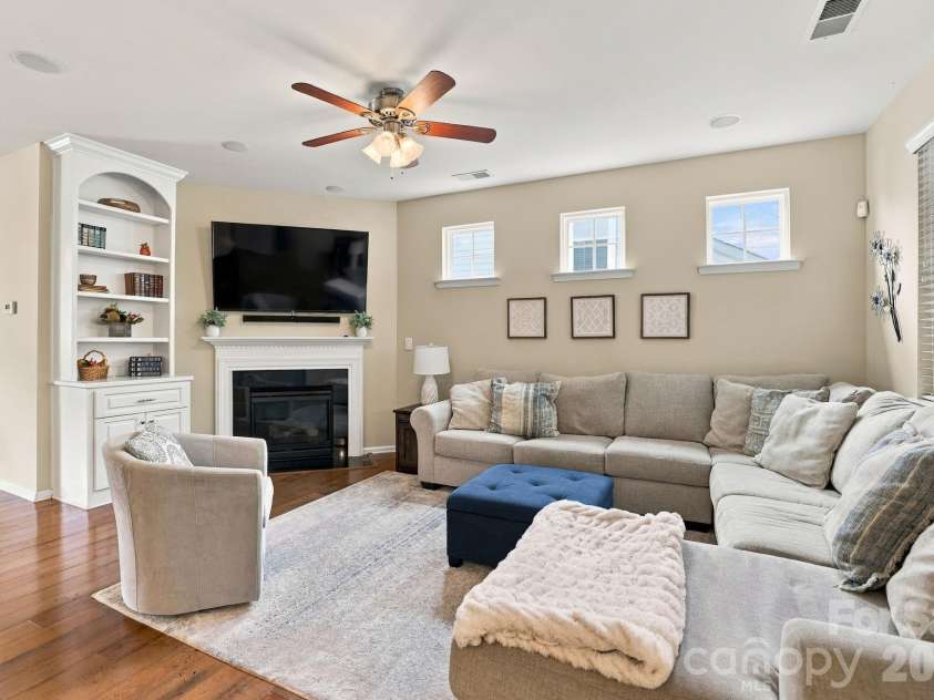 1236 Screech Owl Road, Waxhaw, NC 28173.  MLS# CAR4424430, YatesRealty ID 51502. Den with a Gas Log Fireplace