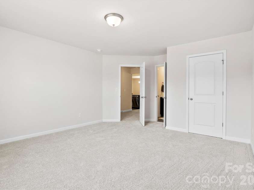 134 Cypress Lane, Linwood, NC 27299.  MLS# CAR4424091, YatesRealty ID 51510. Flex room on main level with closet and attached full bath