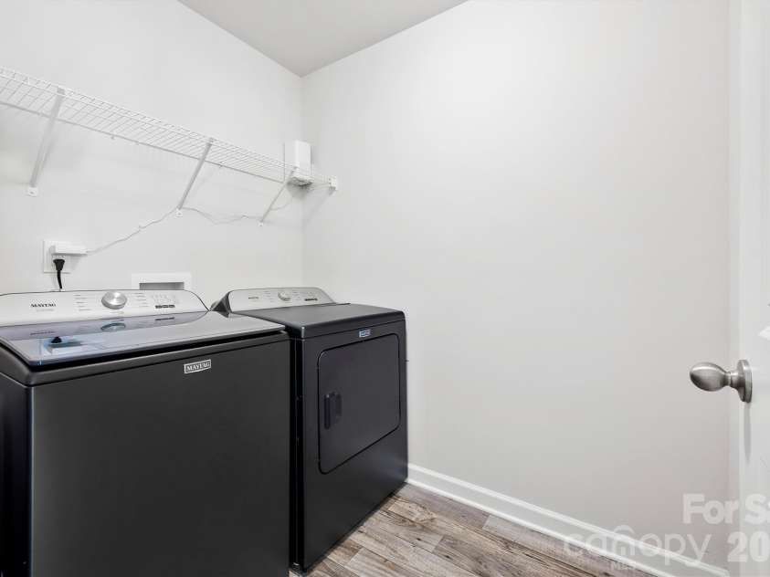 134 Cypress Lane, Linwood, NC 27299.  MLS# CAR4424091, YatesRealty ID 51510. Laundry room right off garage