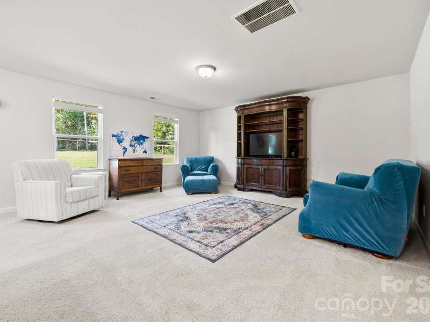 134 Cypress Lane, Linwood, NC 27299.  MLS# CAR4424091, YatesRealty ID 51510. Living area right off kitchen