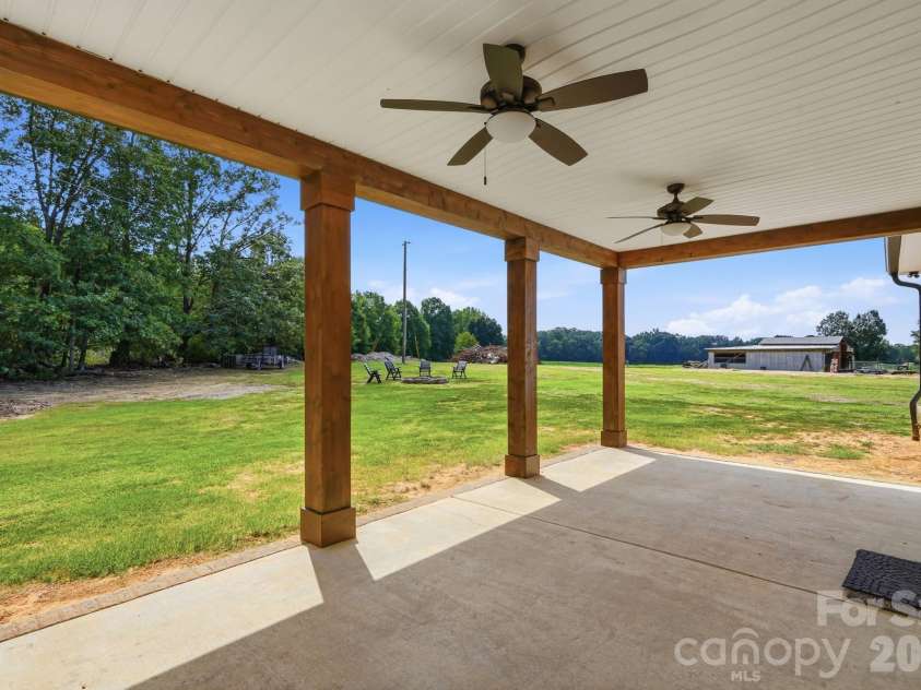 5115 Waxhaw Highway, Monroe, NC 28112.  MLS# CAR4424543, YatesRealty ID 51514. Huge Covered Back Patio
