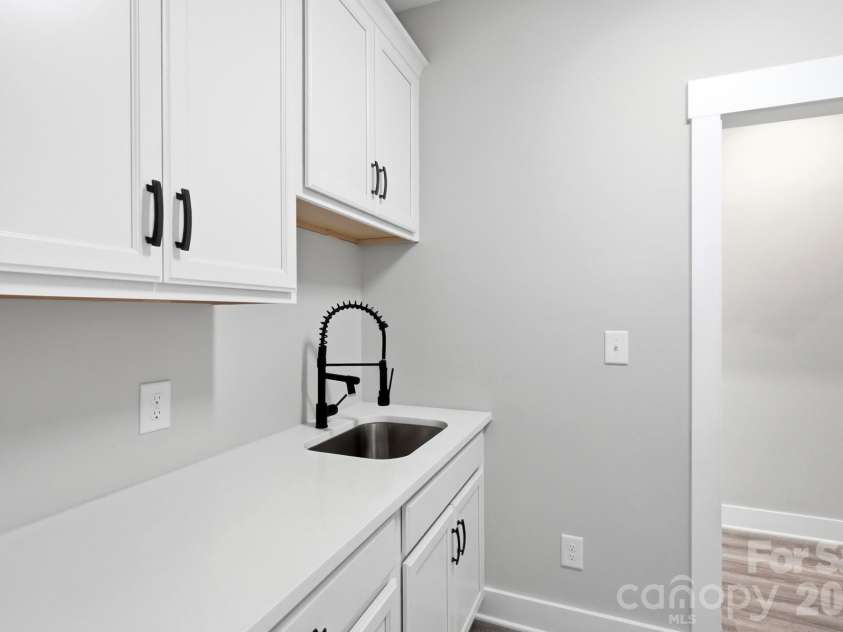 5115 Waxhaw Highway, Monroe, NC 28112.  MLS# CAR4424543, YatesRealty ID 51514. Huge Laundry Room