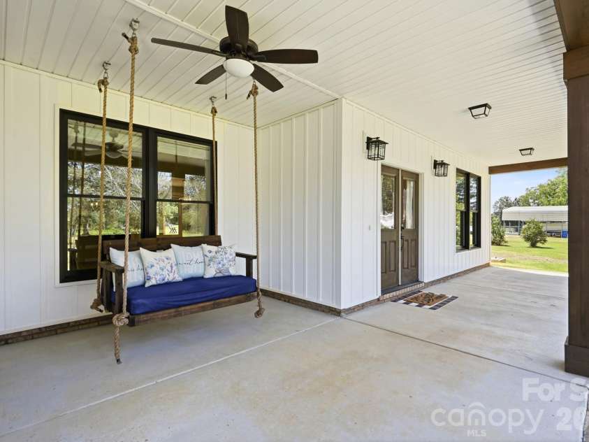 5115 Waxhaw Highway, Monroe, NC 28112.  MLS# CAR4424543, YatesRealty ID 51514. Plus a Custom Porch Swing