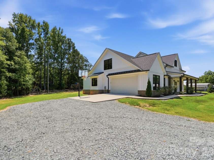 5115 Waxhaw Highway, Monroe, NC 28112.  MLS# CAR4424543, YatesRealty ID 51514. Side Load Garage