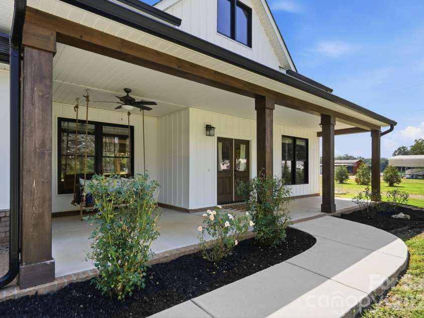 5115 Waxhaw Highway, Monroe, NC 28112.  MLS# CAR4424543, YatesRealty ID 51514. Stunning Large Covered Porch
