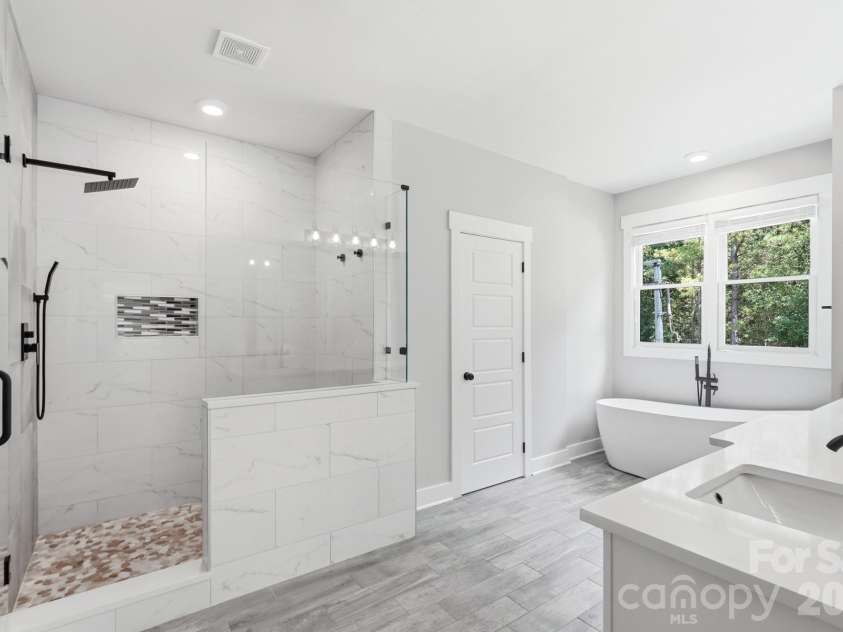 5115 Waxhaw Highway, Monroe, NC 28112.  MLS# CAR4424543, YatesRealty ID 51514. Stunning Primary Bathroom