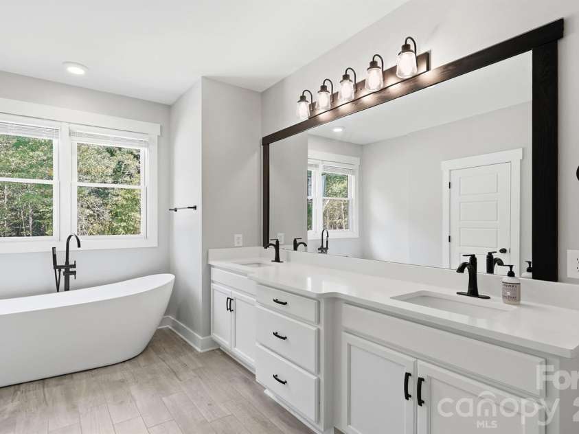 5115 Waxhaw Highway, Monroe, NC 28112.  MLS# CAR4424543, YatesRealty ID 51514. Stunning Primary Bathroom