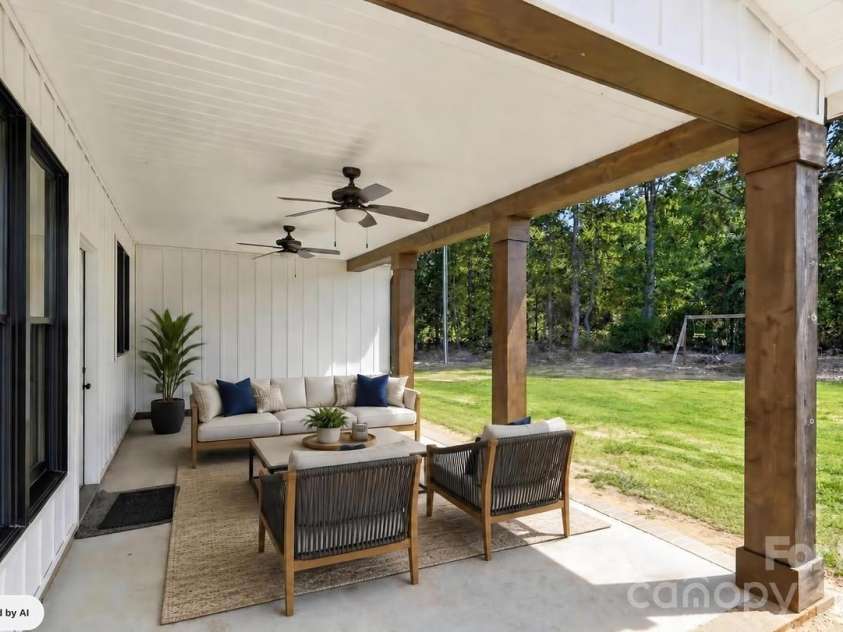 5115 Waxhaw Highway, Monroe, NC 28112.  MLS# CAR4424543, YatesRealty ID 51514. Virtually Staged Covered Back Patio