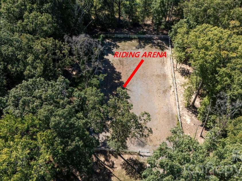 1517 Helms Short Cut Road, Monroe, NC 28112.  MLS# CAR4424290, YatesRealty ID 51519. Back riding arean