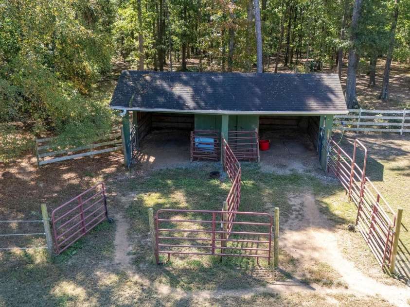 1517 Helms Short Cut Road, Monroe, NC 28112.  MLS# CAR4424290, YatesRealty ID 51519. Birds eye view of barn and paddock