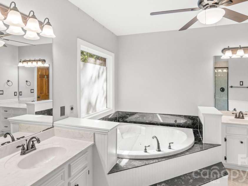 1517 Helms Short Cut Road, Monroe, NC 28112.  MLS# CAR4424290, YatesRealty ID 51519. Primary barh with jetted tub
