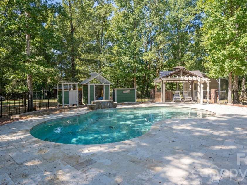 1517 Helms Short Cut Road, Monroe, NC 28112.  MLS# CAR4424290, YatesRealty ID 51519. Salt water pool with large deck