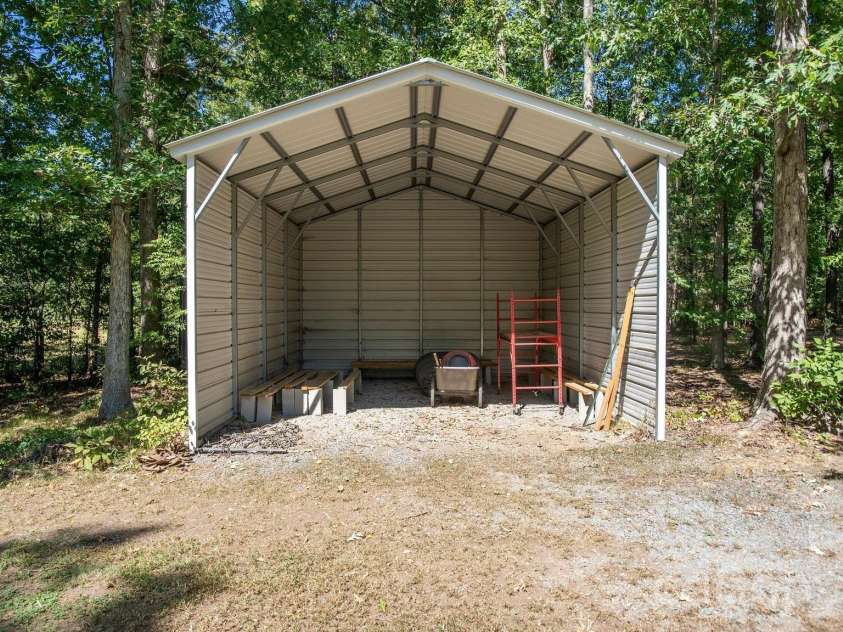 1517 Helms Short Cut Road, Monroe, NC 28112.  MLS# CAR4424290, YatesRealty ID 51519. Storage for hay or trailer or tractor