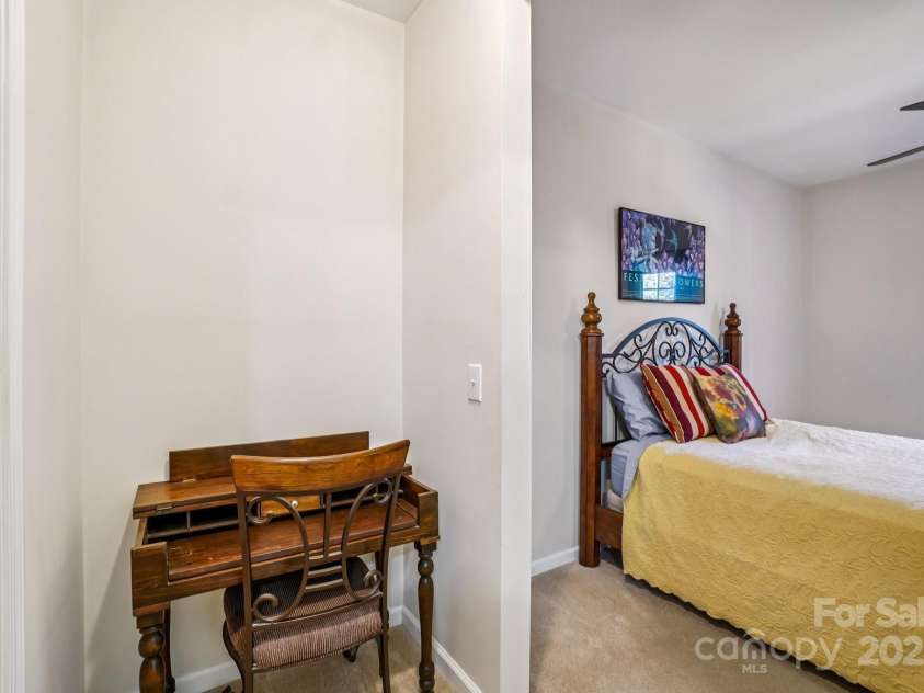 316 Appeldoorn Circle, Asheville, NC 28803.  MLS# CAR4316997, YatesRealty ID 51520. Area between primary bedroom and closet. 