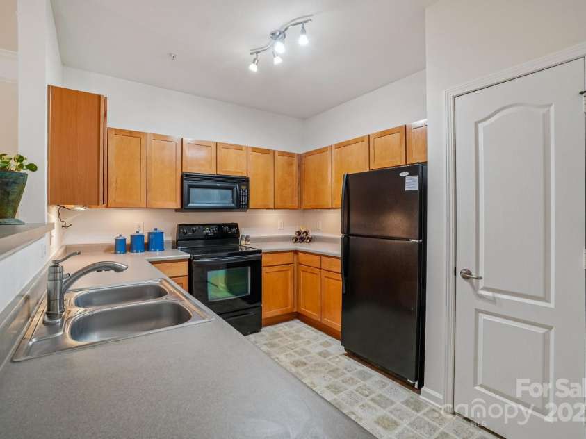 316 Appeldoorn Circle, Asheville, NC 28803.  MLS# CAR4316997, YatesRealty ID 51520. Kitchen with pantry