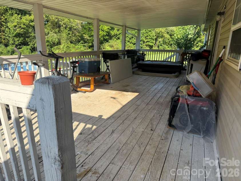 907 Epley Drive, Marion, NC 28752.  MLS# CAR4424716, YatesRealty ID 51528. Back deck
